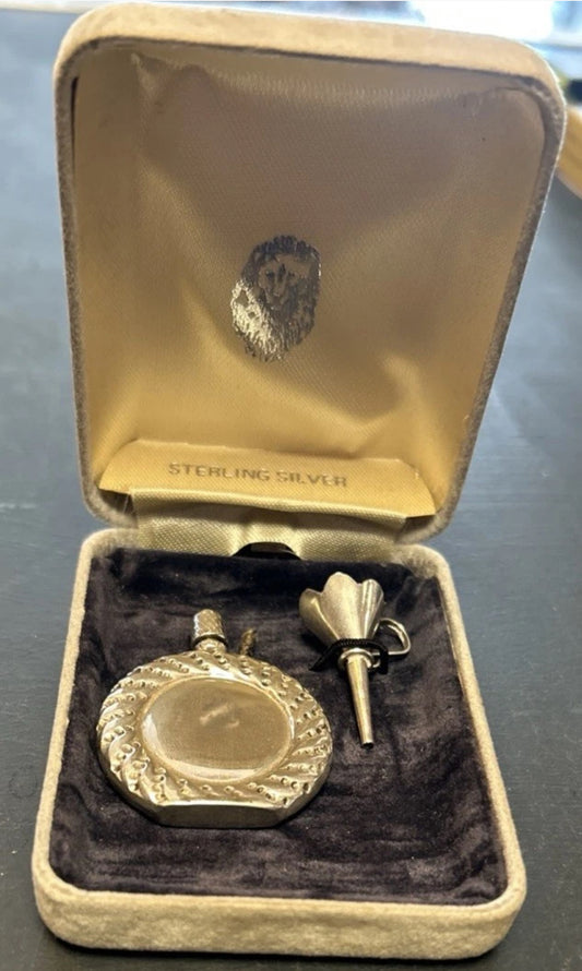vintage silver perfume bottle and funnel