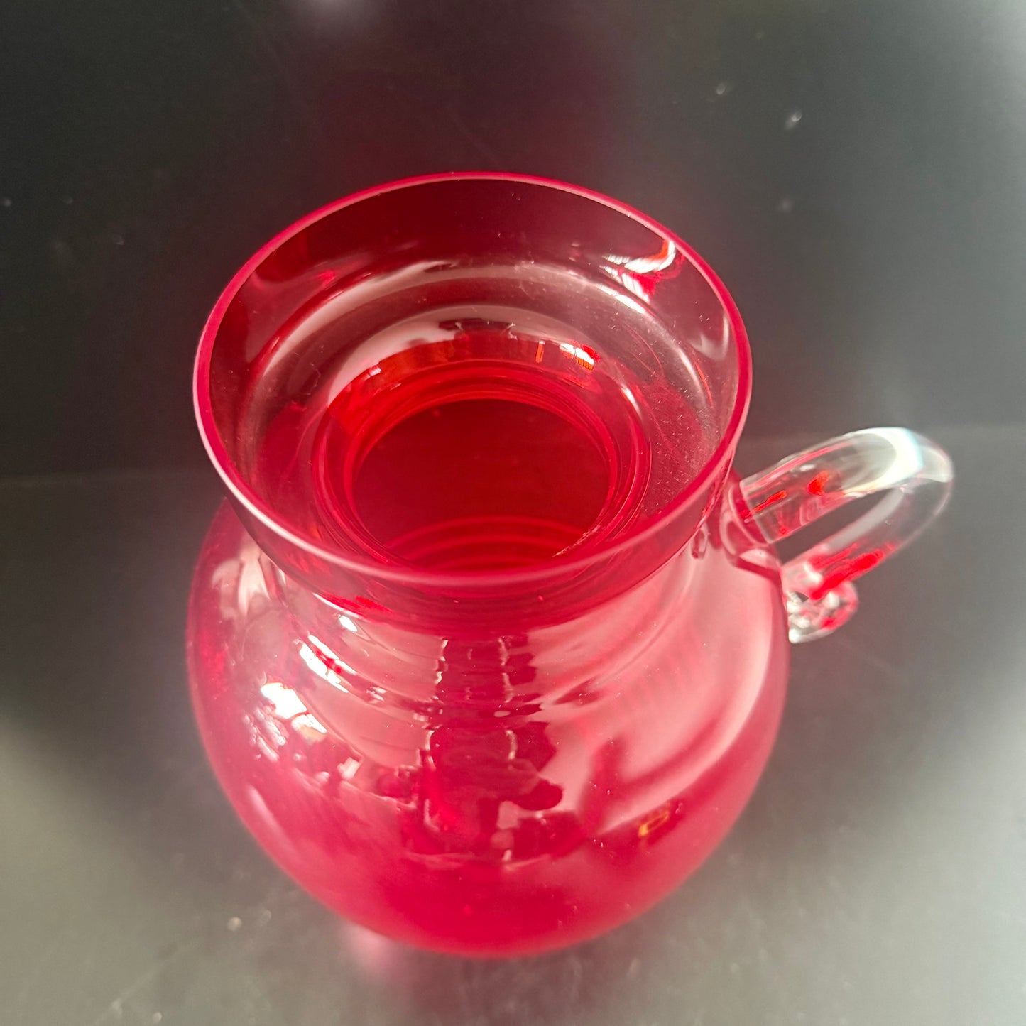Red decorative glass jug