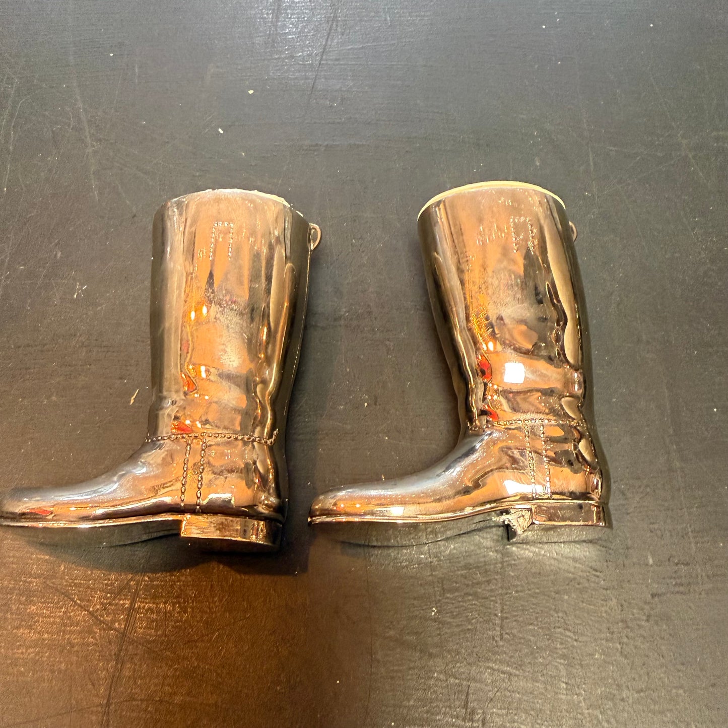 Pair of sliver plated boots