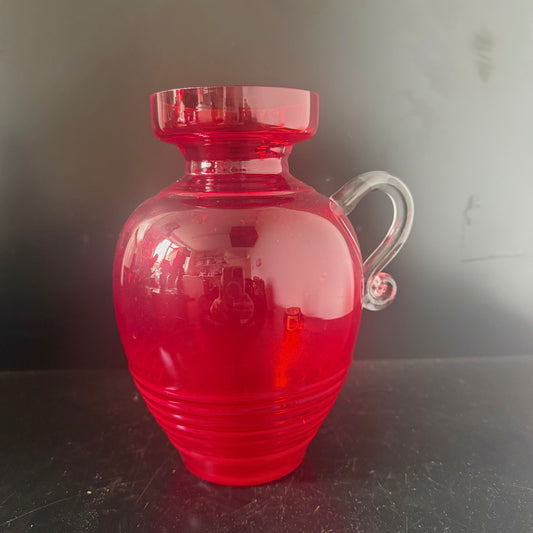 Red decorative glass jug